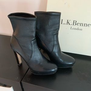 Black boots made in Spain with small platform.
